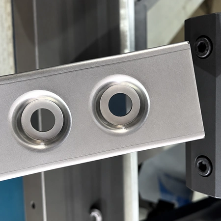 Learn how sheet metal embossing forms raised features, how to design embosses, choose tooling, prevent defects, and specify custom metal parts.